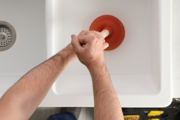 expert-drain-clearing-blocked-drains-port-elizabeth professional-plumber-cleaning-blocked-drains-port-elizabeth-with-advanced-equipment-rob-millar-plumbers